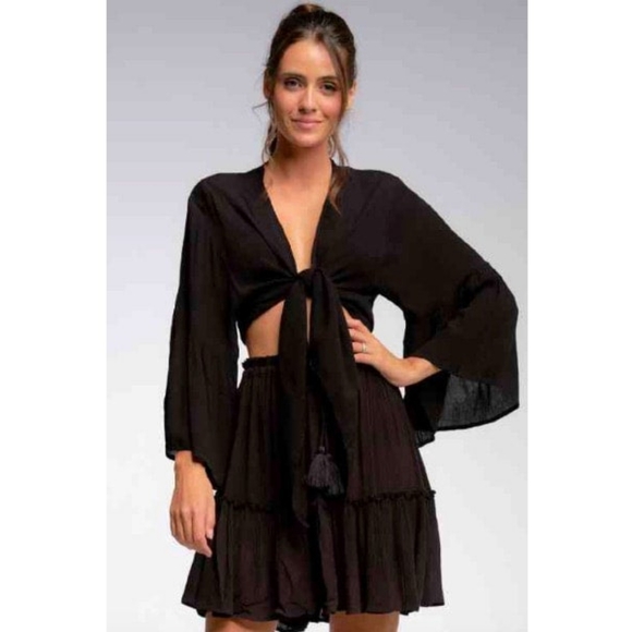 Our wrap top one size add to your wardrobe for a fun and versatile piece - Picture 3 of 4